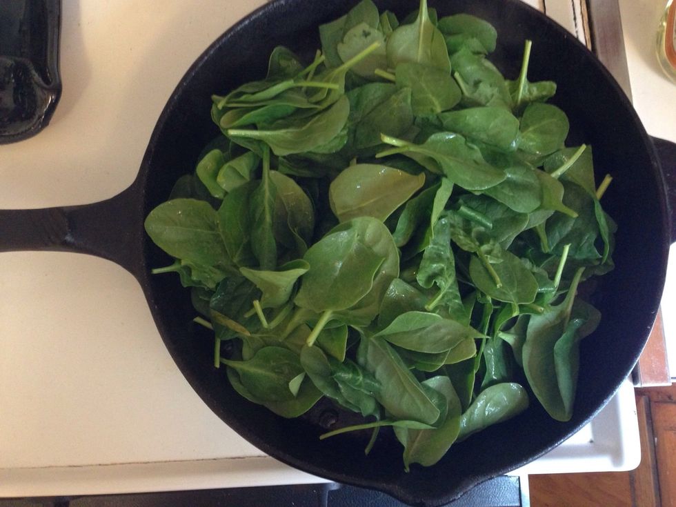 Add spinach to hot skillet. I used the entire box of spinach.