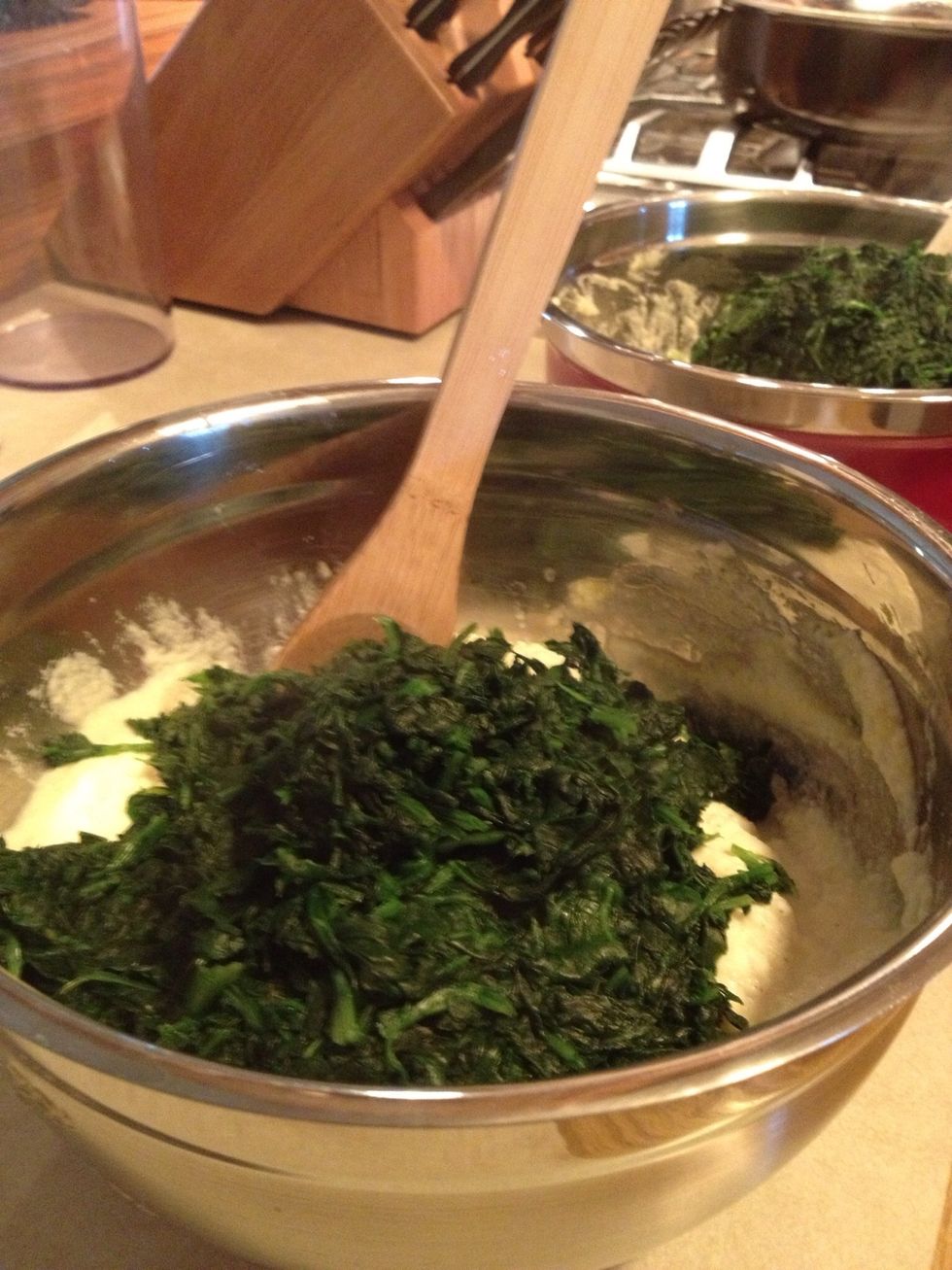 Add spinach to ricotta mixture