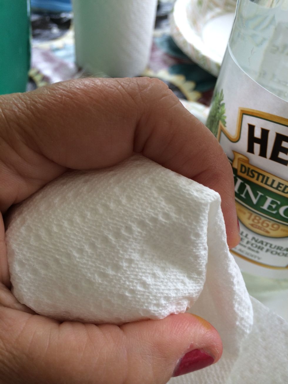 Add sprinkles of Vinegar to the damp paper towel then lossy wrap around softly the egg.