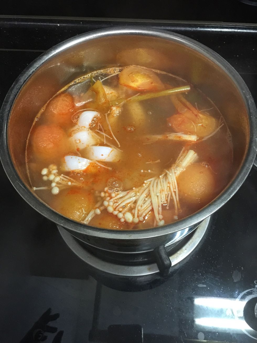 Add squids and prawns and cook no more than 2 minutes.