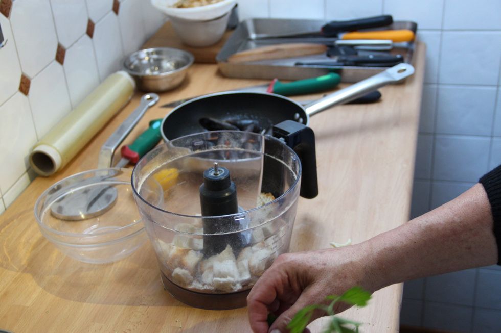 Add stale bread, garlic and parsely