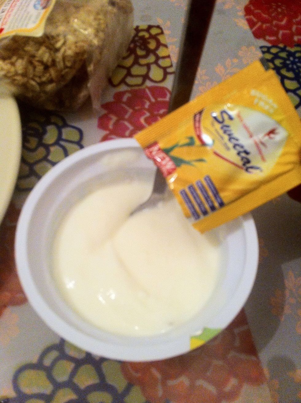 Add stevia sugar into the yoghurt.