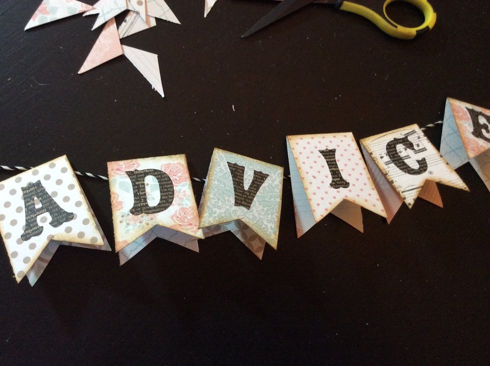 Add sticker letters to create title.
