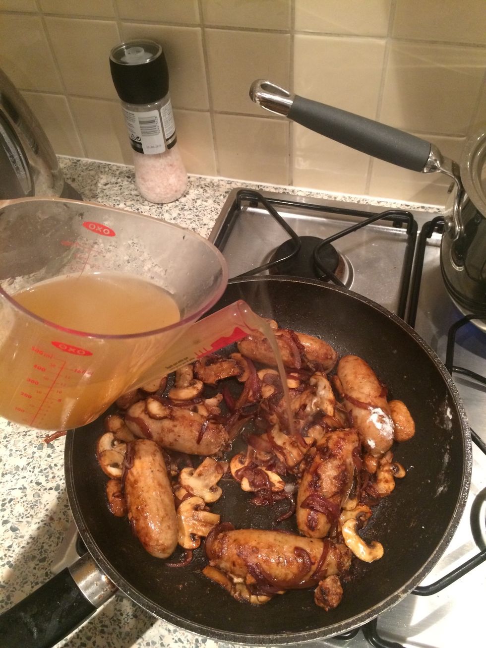 Add stock slowly and whisk
