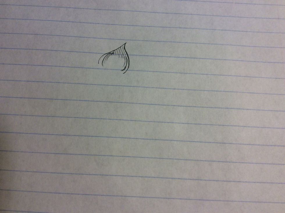 Add straight strokes coming down from the top of the petal and curved strokes coming down the sides with your pencil.