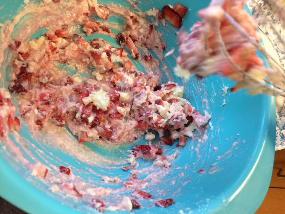 Add strawberries to cream cheese mixture until strawberries are evenly coated