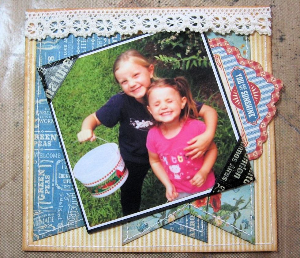 Add strip of crochet lace to top edge. Mount prepared photo with foam dimensionals and slip journal tag behind photo.