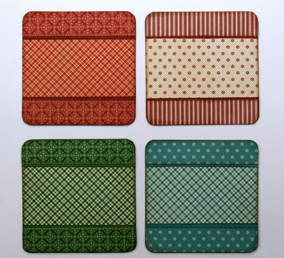 Add strips of coordinating papers separated with a solid cardstock border. Trim the corners and ink.