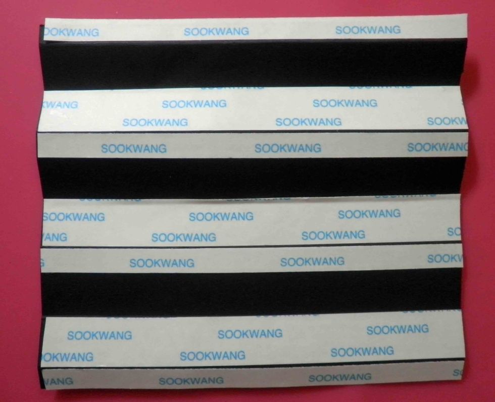 Add strips of Scor-tape along score lines, using \u00bc" strips on the smaller folds, and \u00bd" strips along the wider folds, as shown.