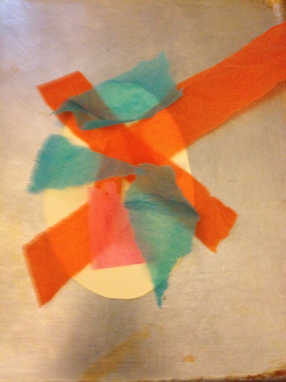 Add strips of tissue one color layer at a time