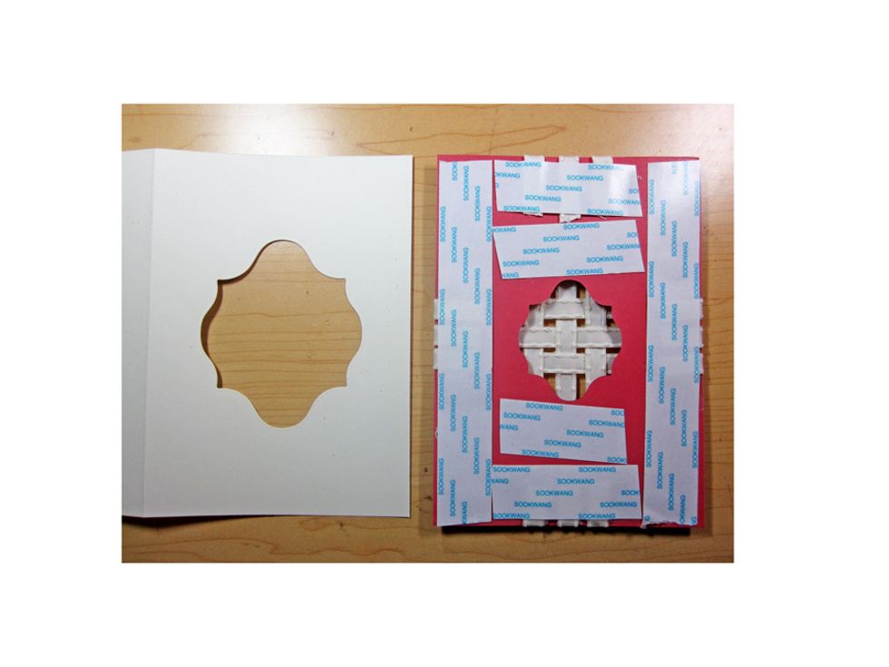 Add strong glue to the back of the woven strip and line up on the base card to attach.