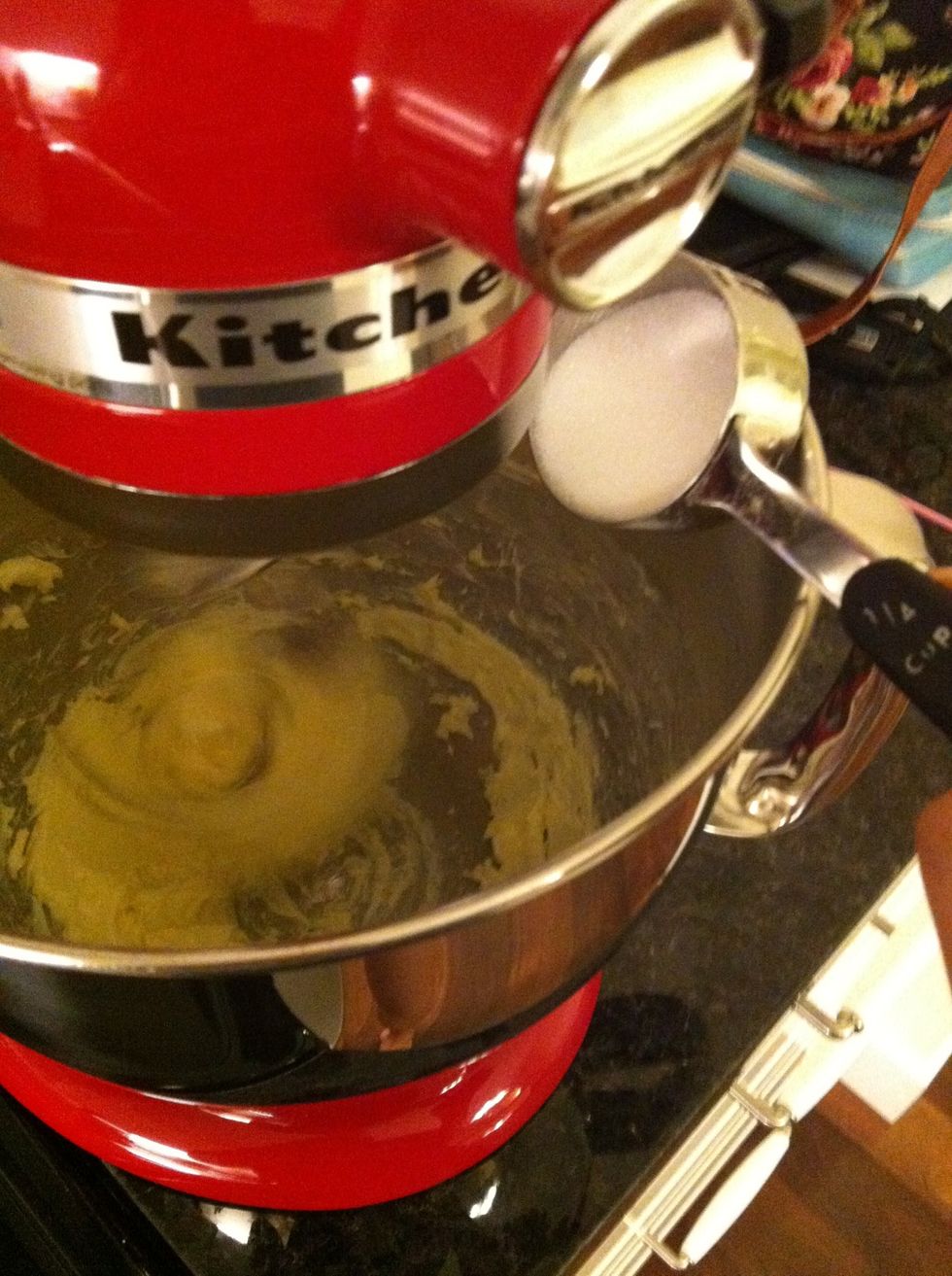 Add sugar 1/4 cup at a time