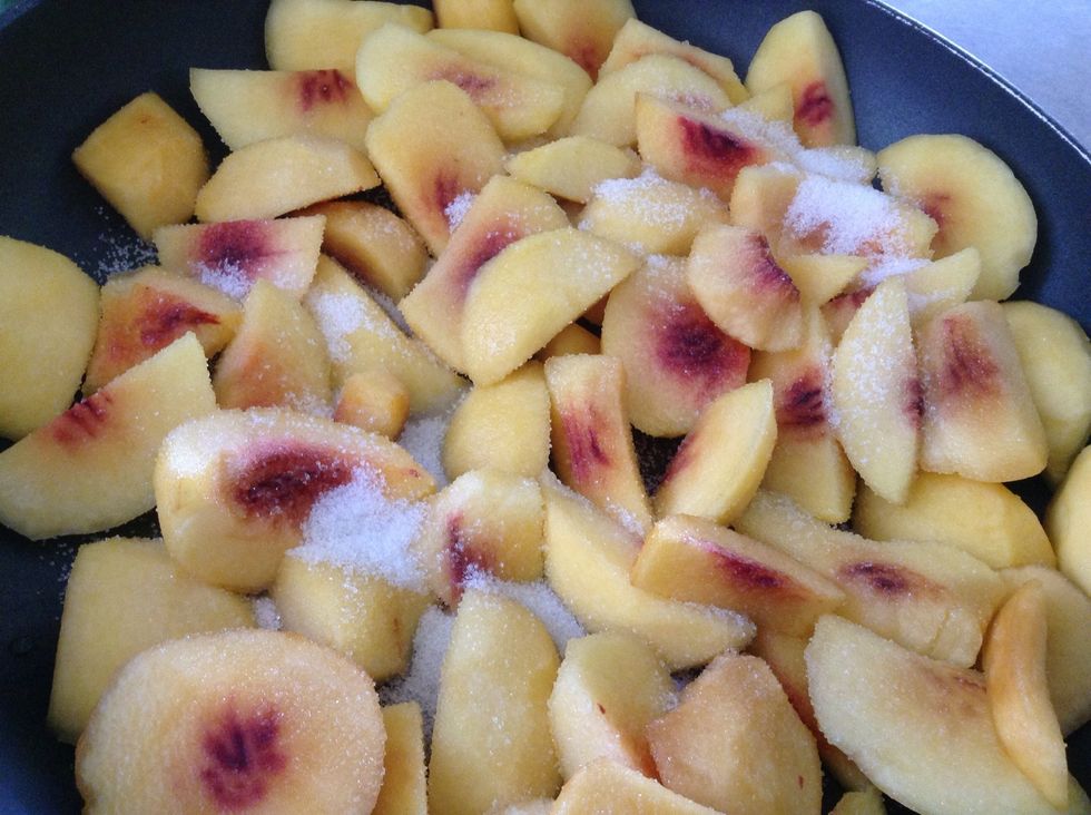 Add sugar(about two teaspoons) and two tablespoons of water