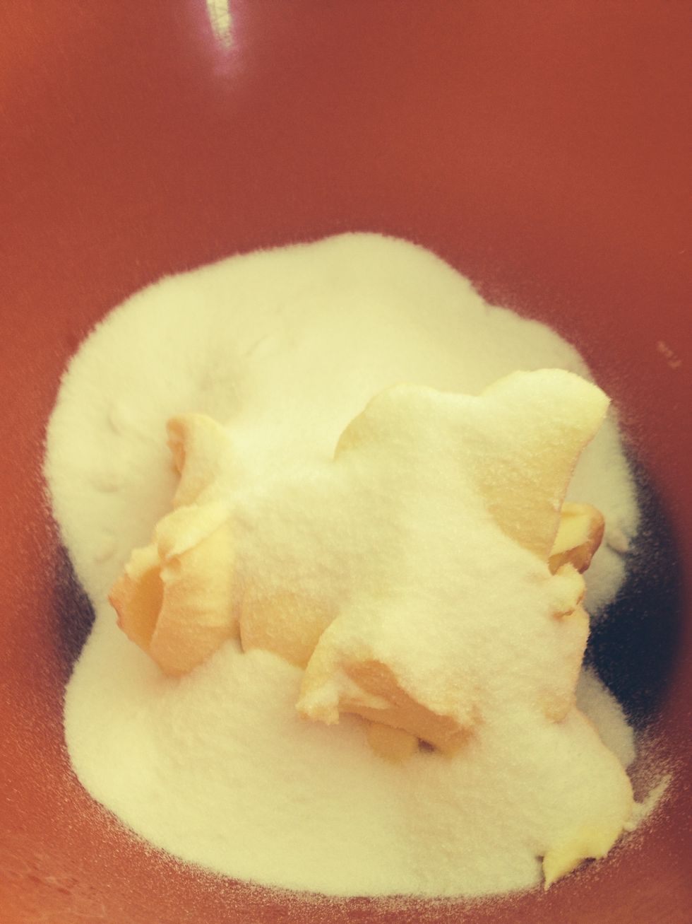 Add sugar and butter to a bowl then combine