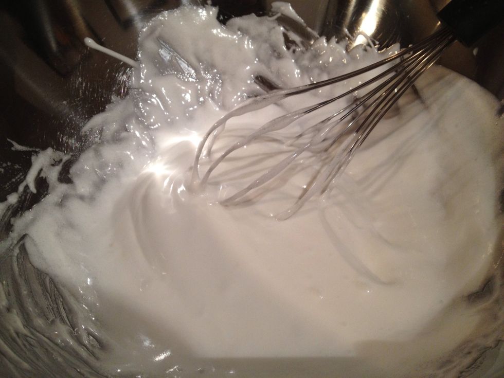 Add sugar and continue whisking until smooth, soft, and thick consistency is achieved.