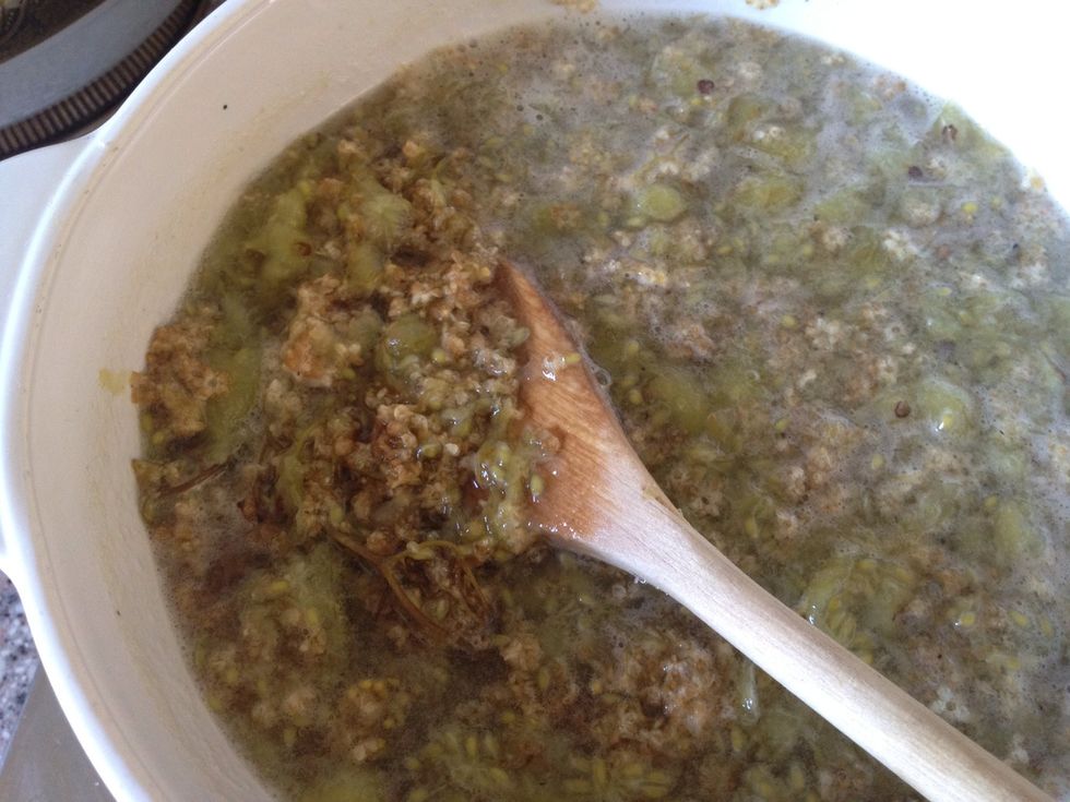 Add sugar and Elderflowers and boil until it sets. To see whether it has set or not put some on a cold plate and run your finger thru the cold jam. If it makes wrinkles it is done, if not boil on.