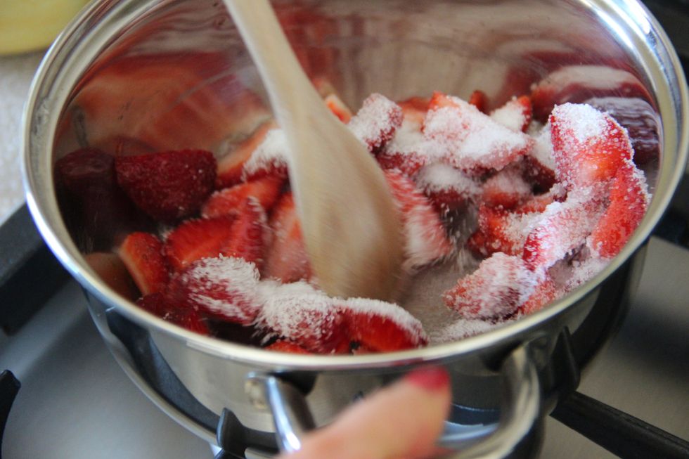 Add sugar and let it boil until the strawberries are soft