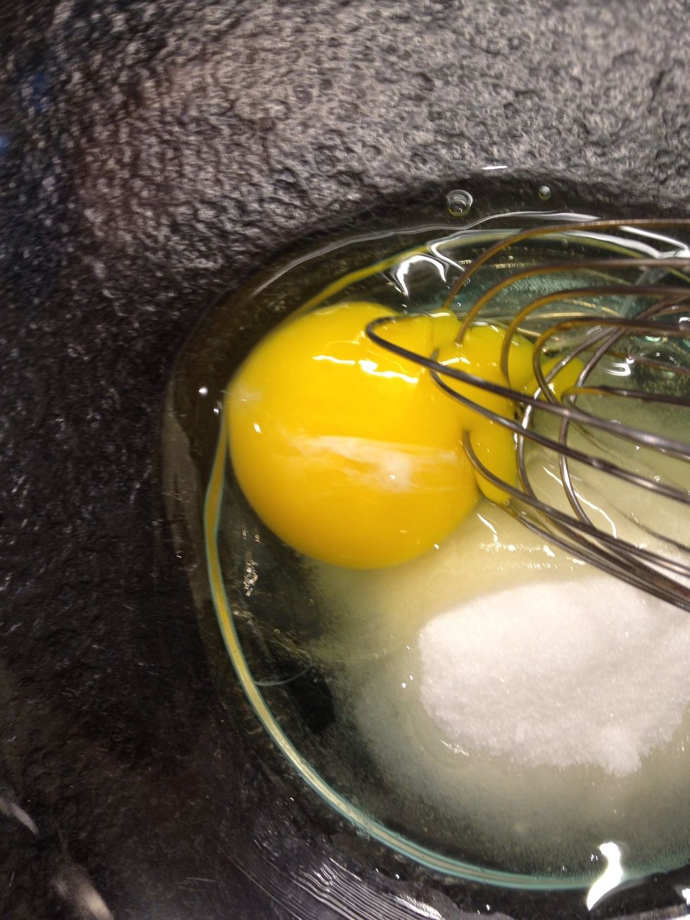 Add sugar and the egg