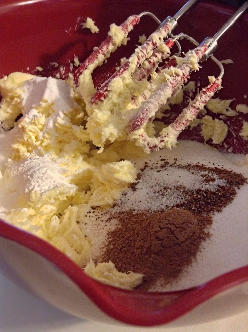 Add sugar, baking powder,baking soda,salt,the 1 teaspoon cinnamon,and the nutmeg. Beat until combined.