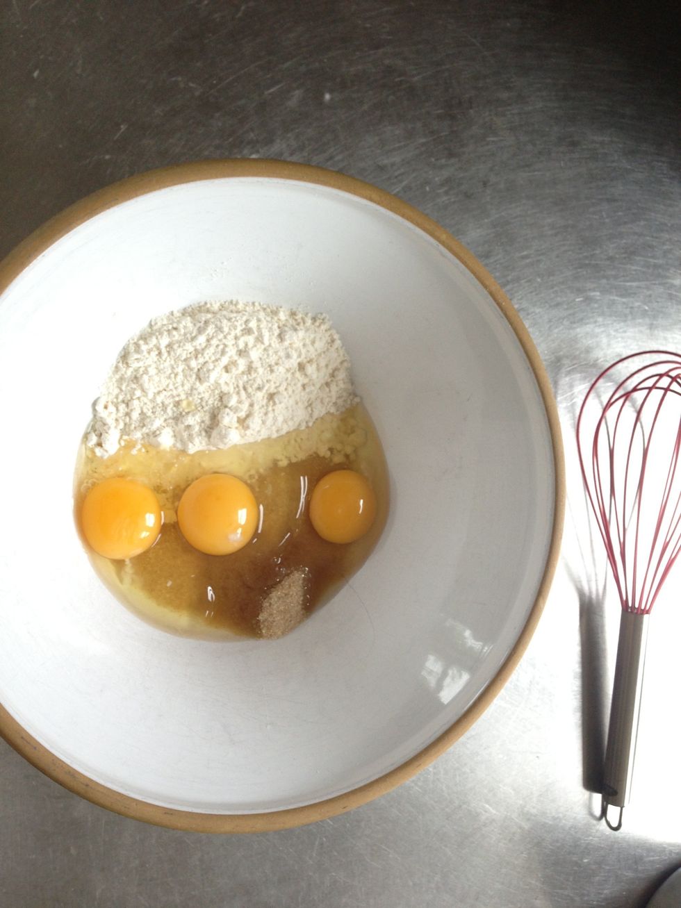 Add sugar, eggs and flour to the bowl.
