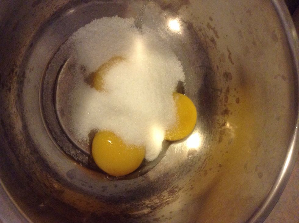 Add sugar. I usually don't measure them but here is the average ratio for you: 1 tablespoon of sugar to 1 egg yolk.