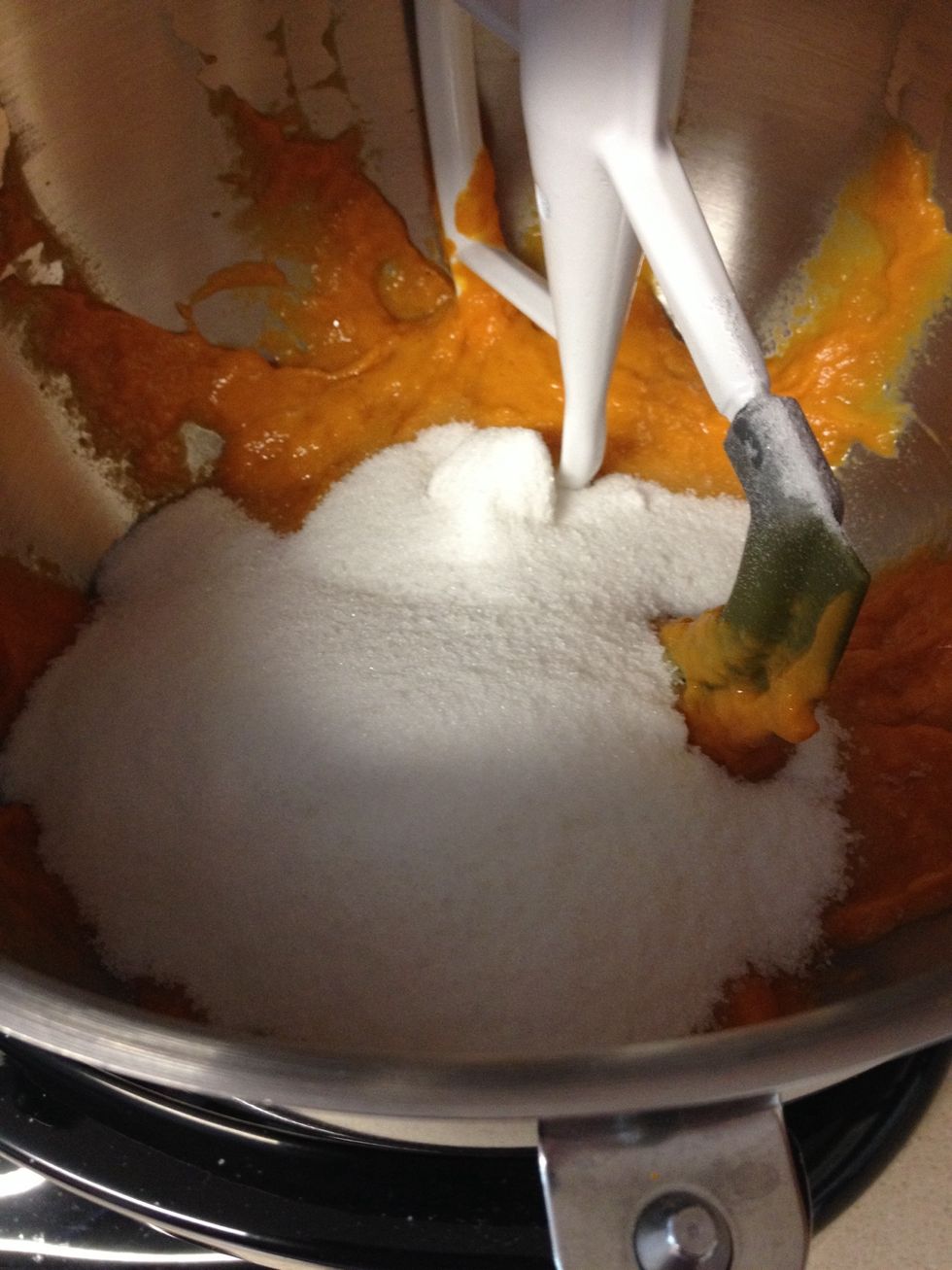 Add sugar into the pumpkin mixture and mix until well combined