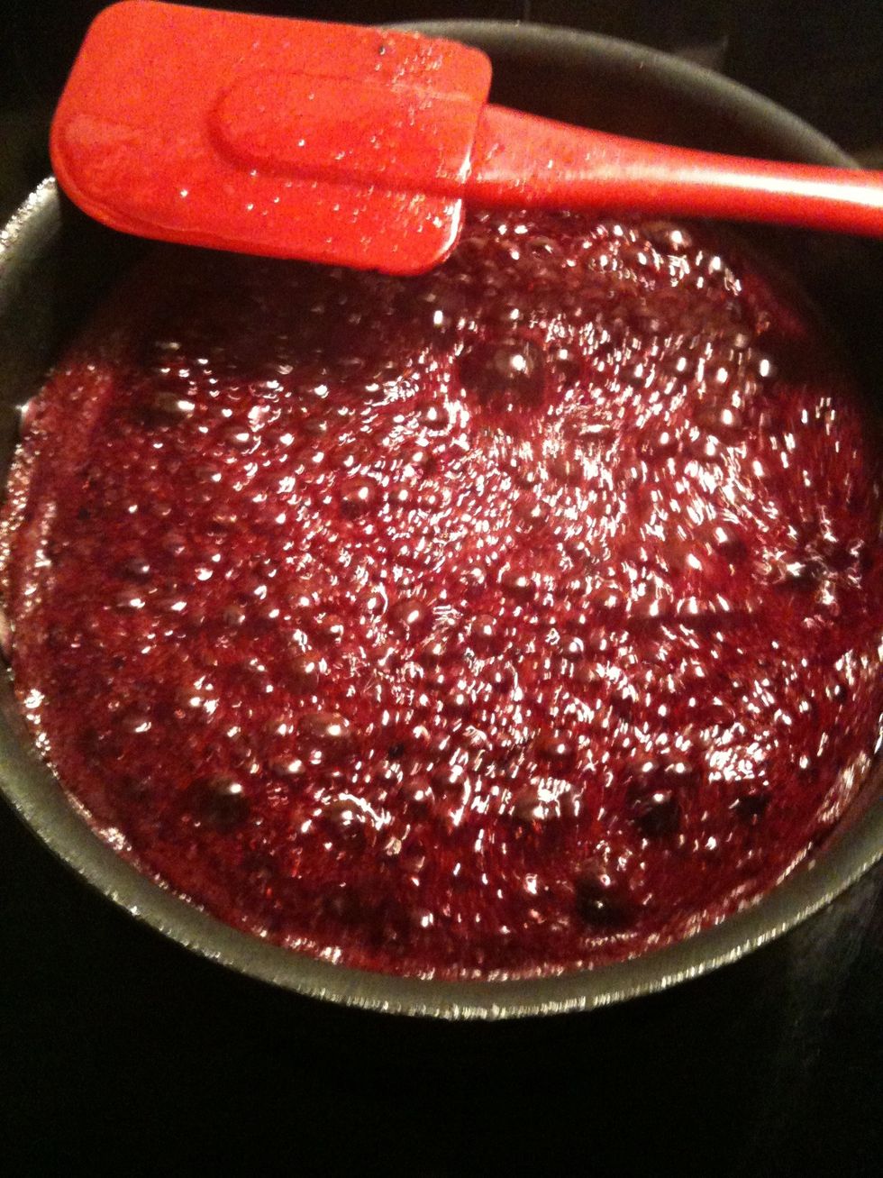 Add sugar, mix well , make sure ALL of the sugar is dissolved and bring  to a boil. Boil without stirring for 15 minutes .  Meanwhile place a glass plate in the freezer ( you'll need it later )