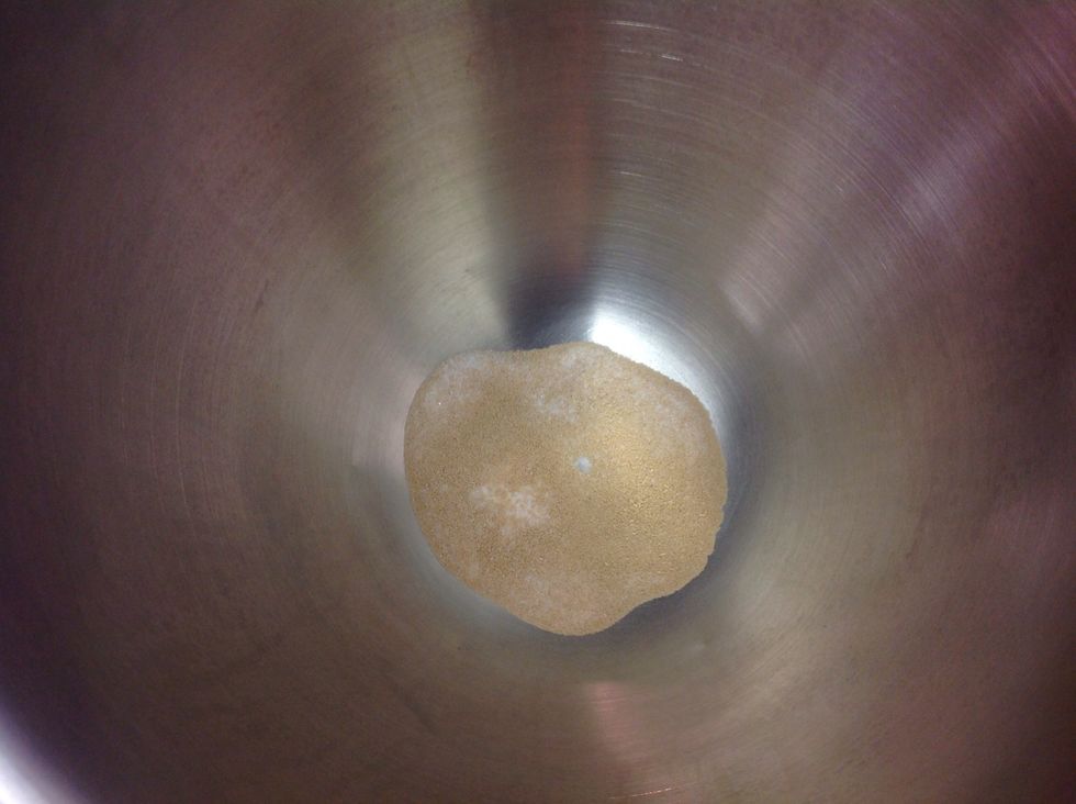 Add sugar, salt, & yeast to bowl of stand mixer. Add warm water and combine. Let stand until foamy, about 5 mins.