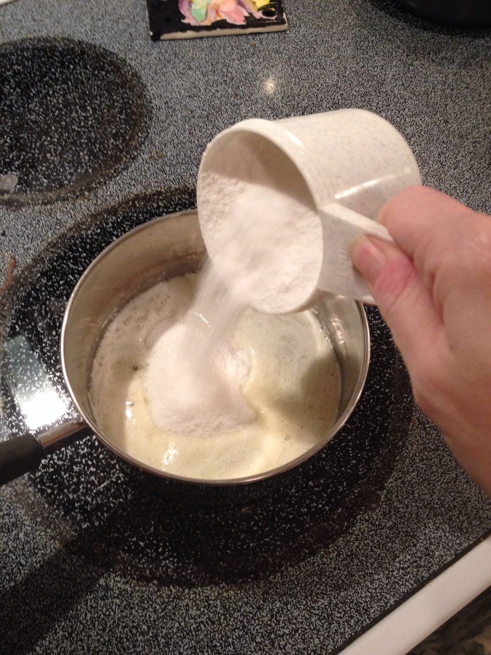 Add sugar. Stir for 3 minutes over a low boil.