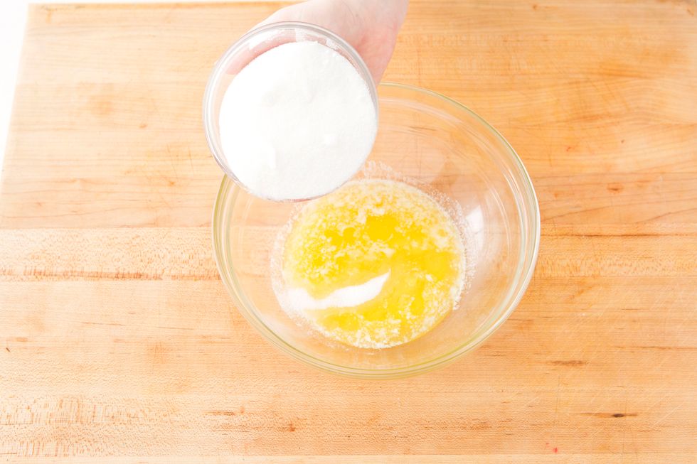 Add sugar to melted butter.