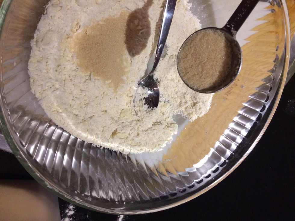 Add sugar to the coconut and breadcrumbs