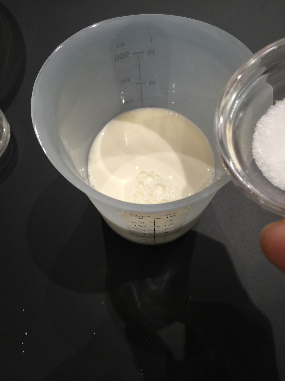 Add sugar to warm milk (heat in the microwave) it should b warm but not hot. And leave to proof. This step is not necessary with instant yeast but I do it to make sure z yeast is still active