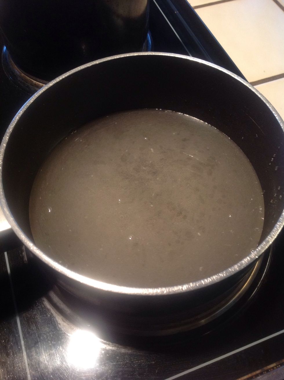 Add sugar & water to medium sized saucepan.