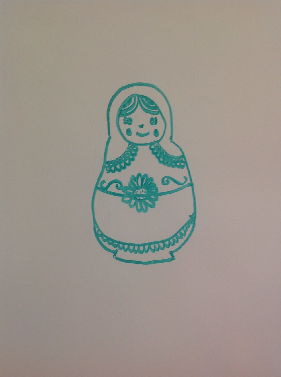 Add swirls next to the flower on the middle