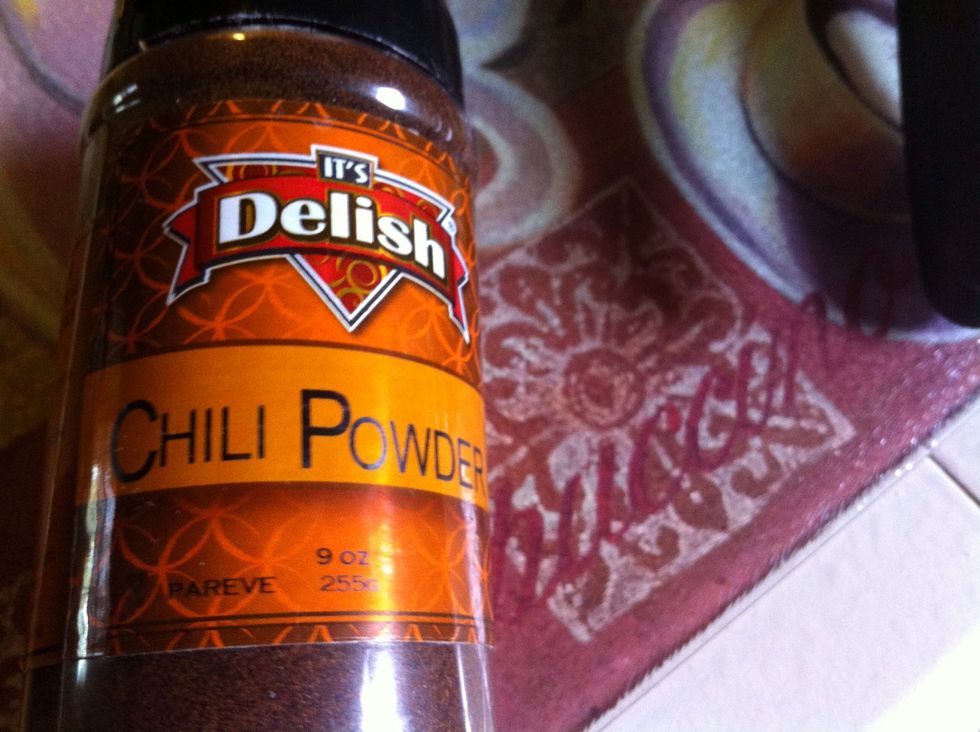 Add tablespoons chili powder, 1 tsp basil, 1/4 tsp black pepper, pinch of cayenne pepper and pinch of red paper flakes. Add heat to your taste.