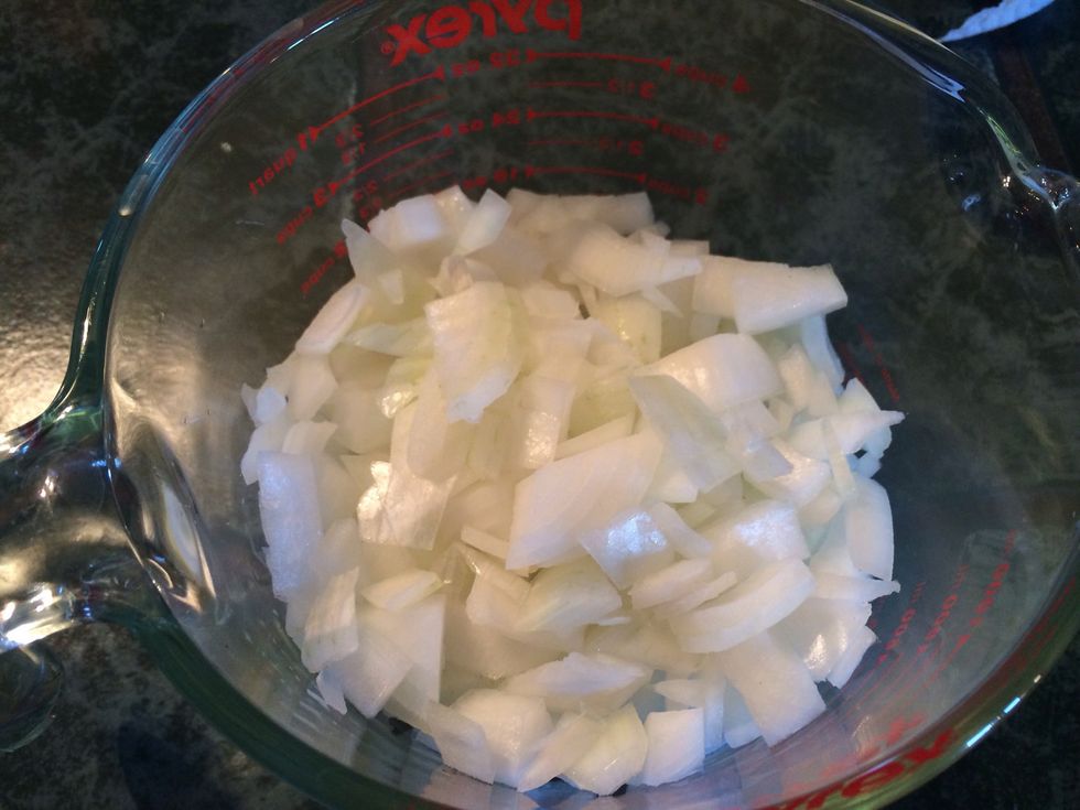 Add the 1/4 stick of butter and diced onion once bacon looks cooked and seems to be separated from most or it's fat.