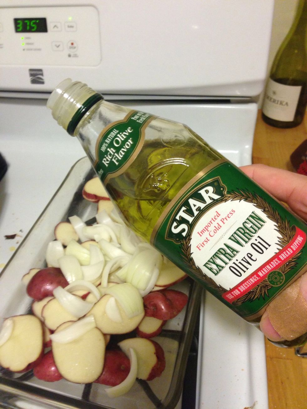 Add the 1/8 c olive oil. I used slightly less, but you want to make sure the potatoes and onions will have a nice coating of olive oil.