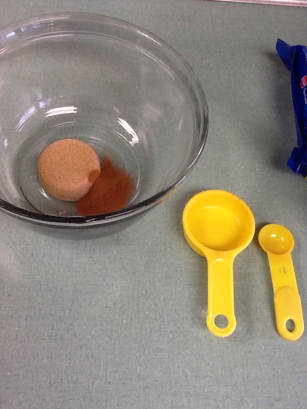 Add the 1 teaspoon of ground cinnamon to the large bowl