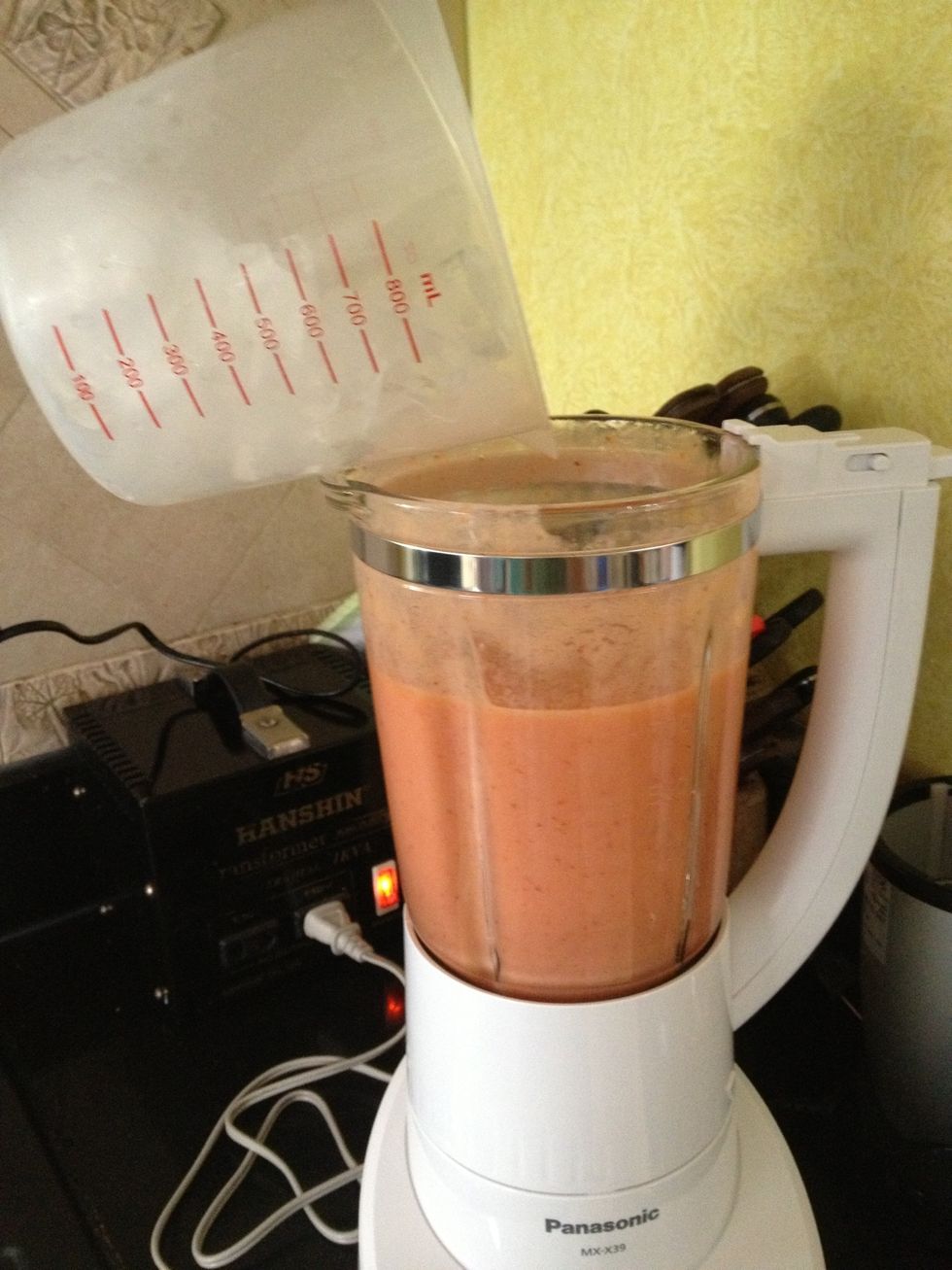 Add the 2 cups of ice, and let it blend until it mixes smoothly. After putting the ice in, change the option on the blender to high.