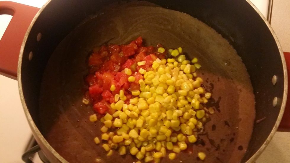 Add the 2 puree of beans, one with onions, one with broth,  , tomatoes cans, and corn, and