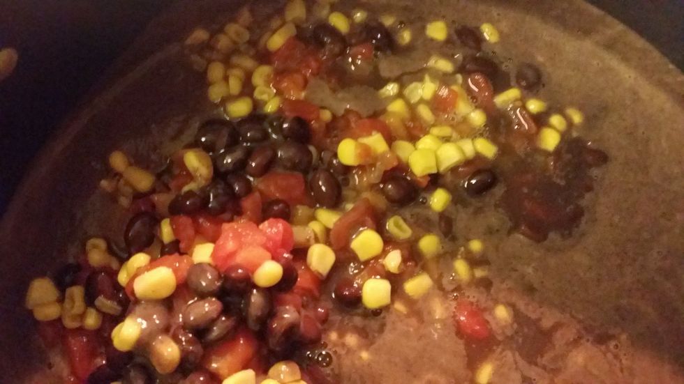 Add the 3d can of black bean, undrained (if you want whole bean in your soup, if not you an mix it with the rest)