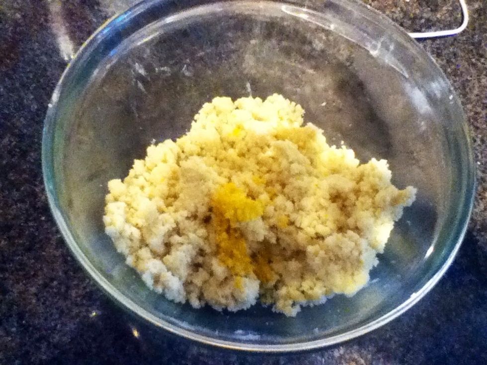 Add the 50g of sugar and whisk/hand-stir the sugar in thouroughly! Zest the lemon and add to the mixture. Use the hand whisk to whisk it into a dough. If it is still to dry add some lemon juice! \ud83d\udc95