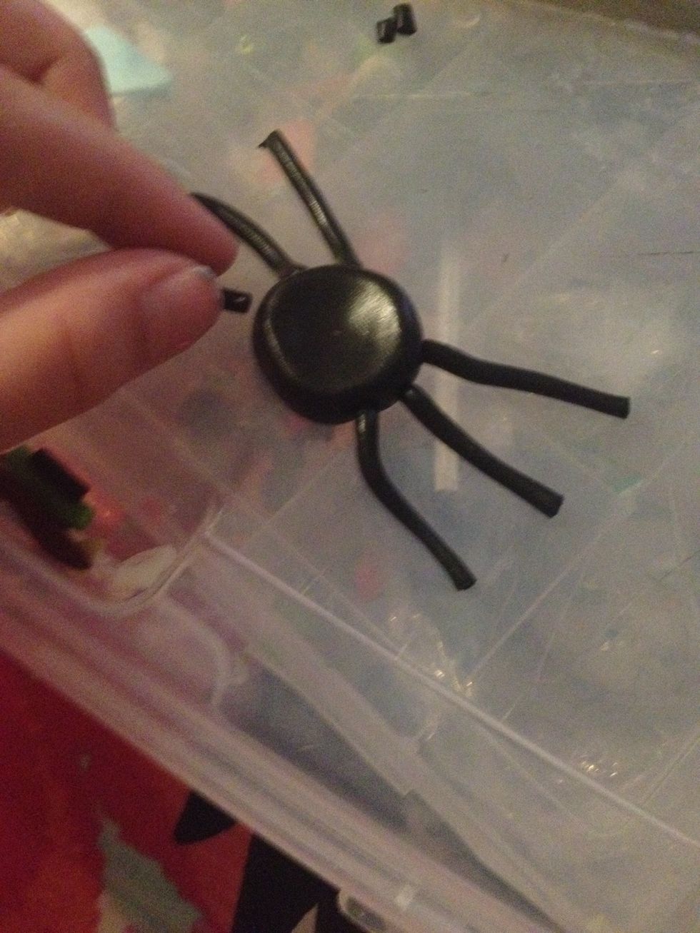 Add the 6 strips on the sides of the spider