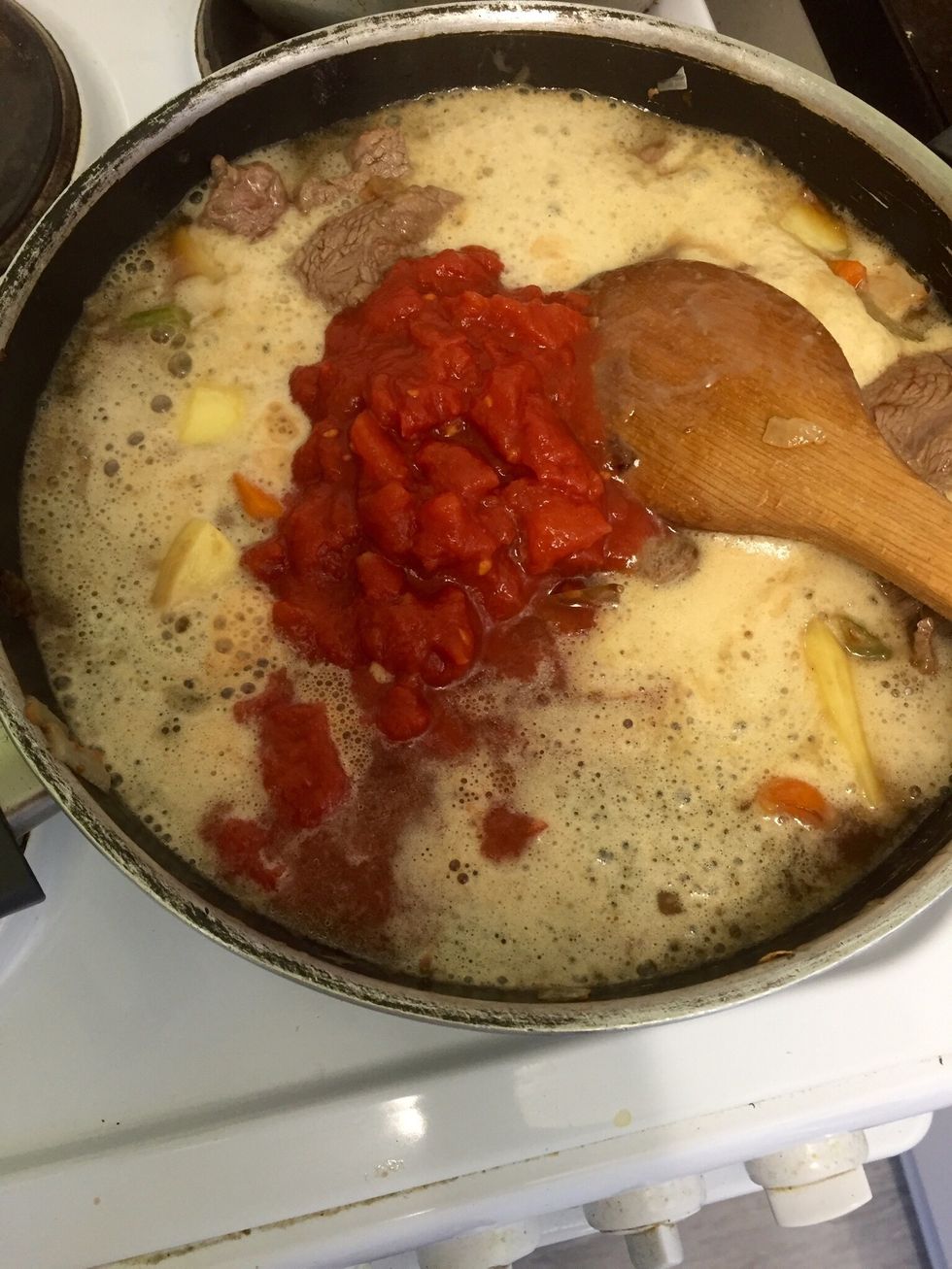 Add the ale, the chopped tomatoes and salt and pepper to taste