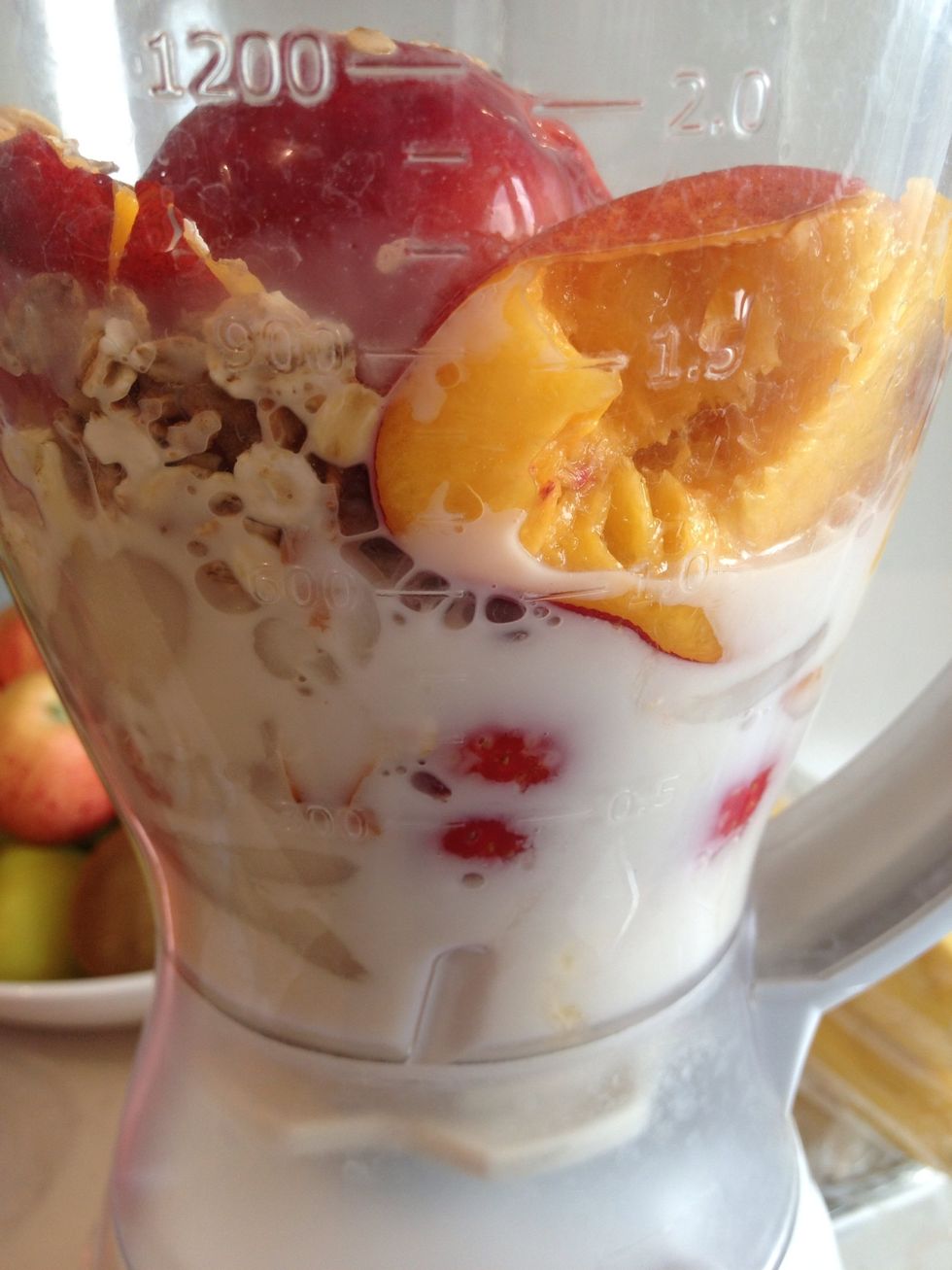 Add the Almond Milk and blend on a low speed until the bulk of the ingredients are blending. Increase quantity of milk depending on desired consistency.
