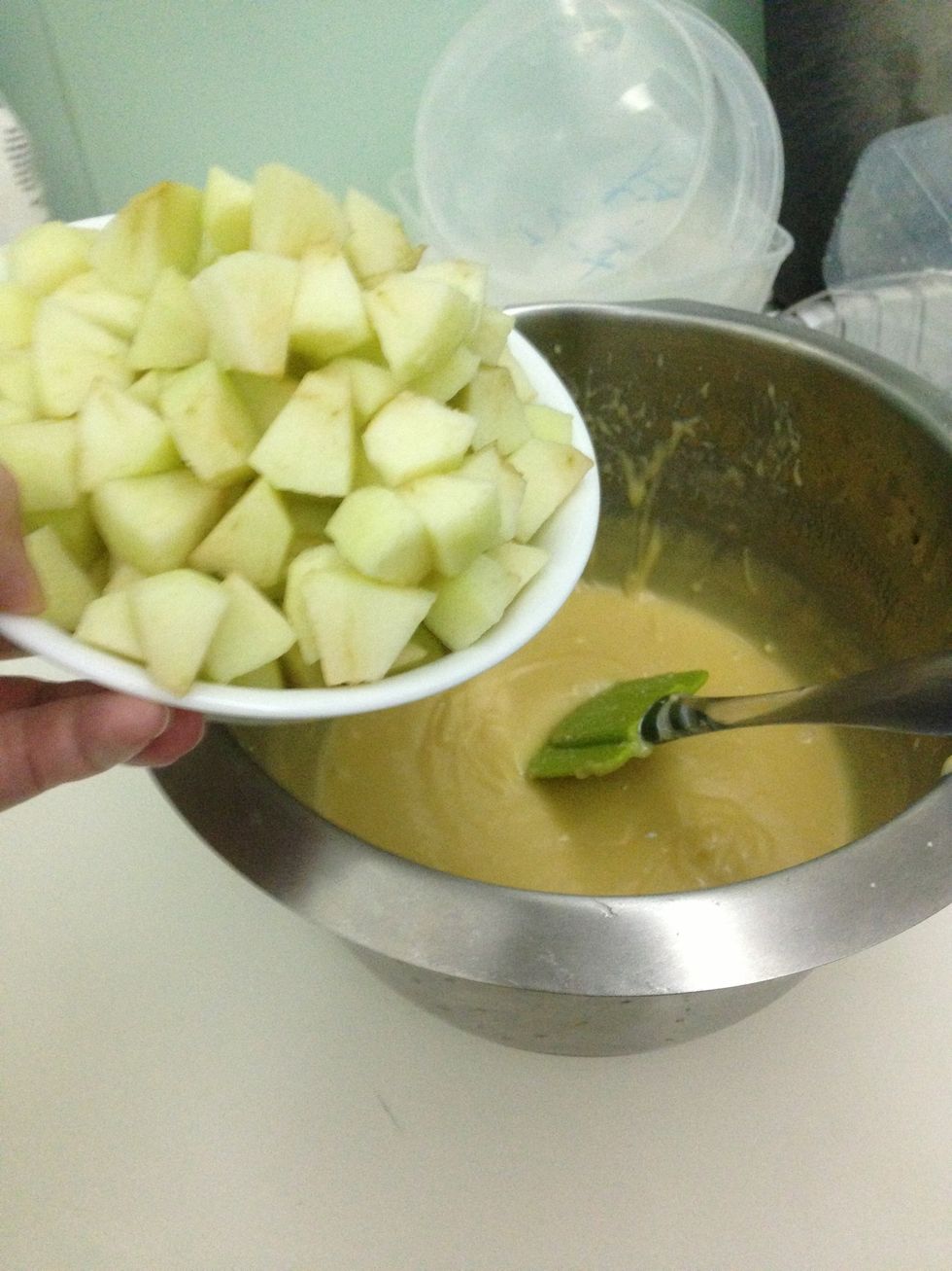Add the apples into the batter