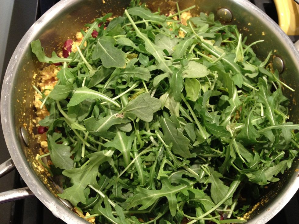 Add the arugula and stir it in, cover the pot for 3 minutes
