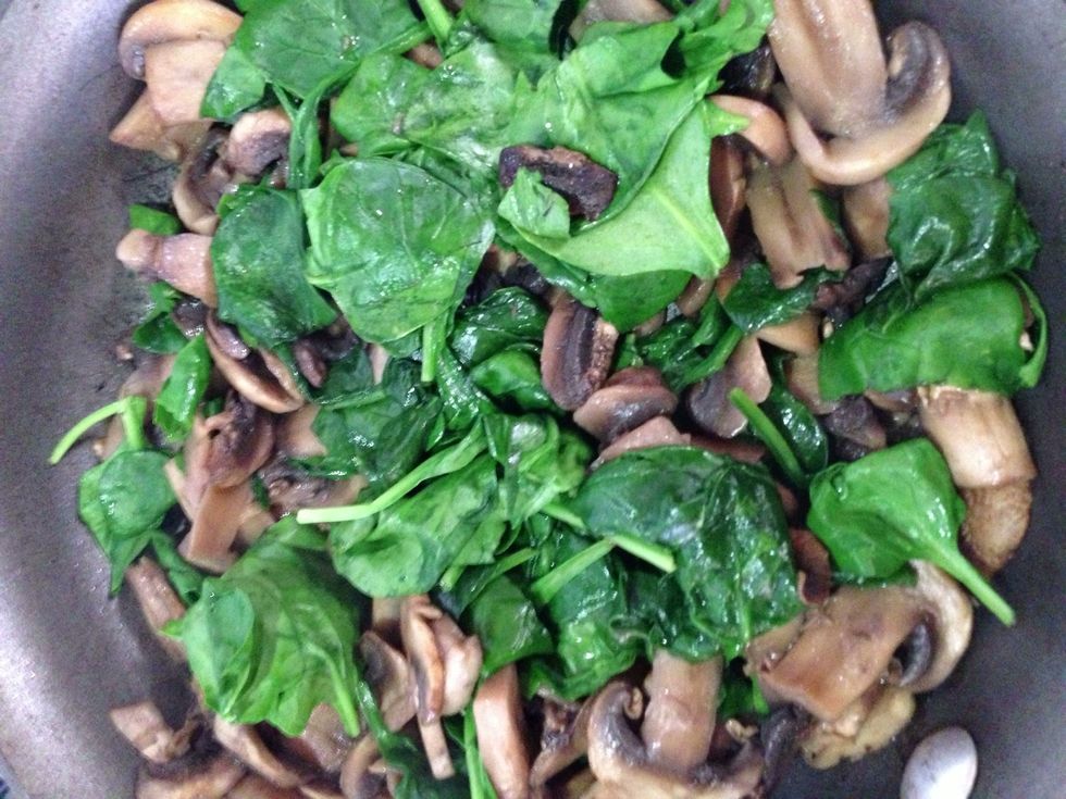 Add the baby spinach and cook until wilted.
