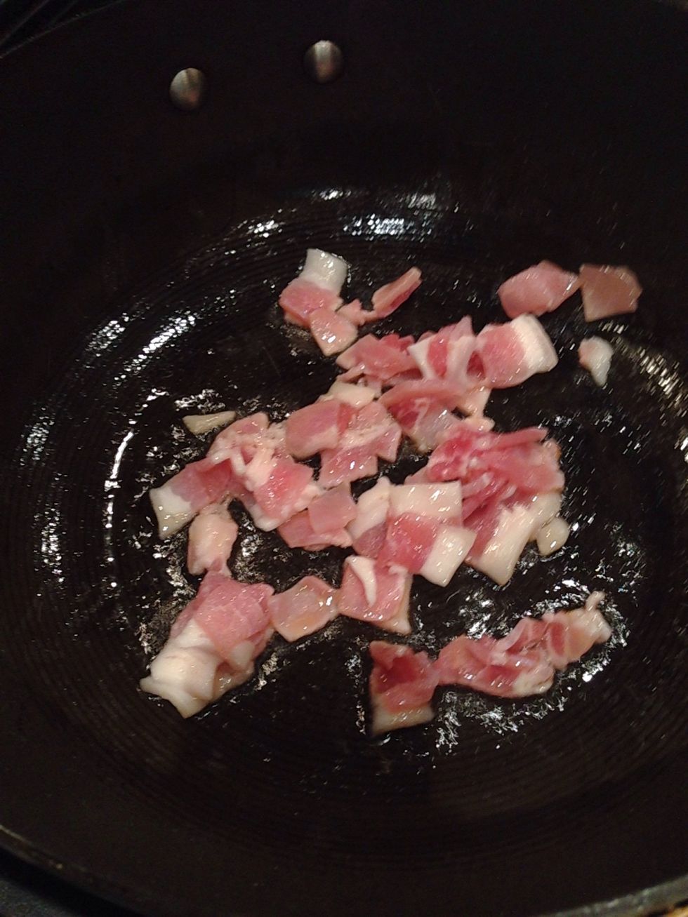 Add the bacon and fry until brown. The. Remove and add to sausages