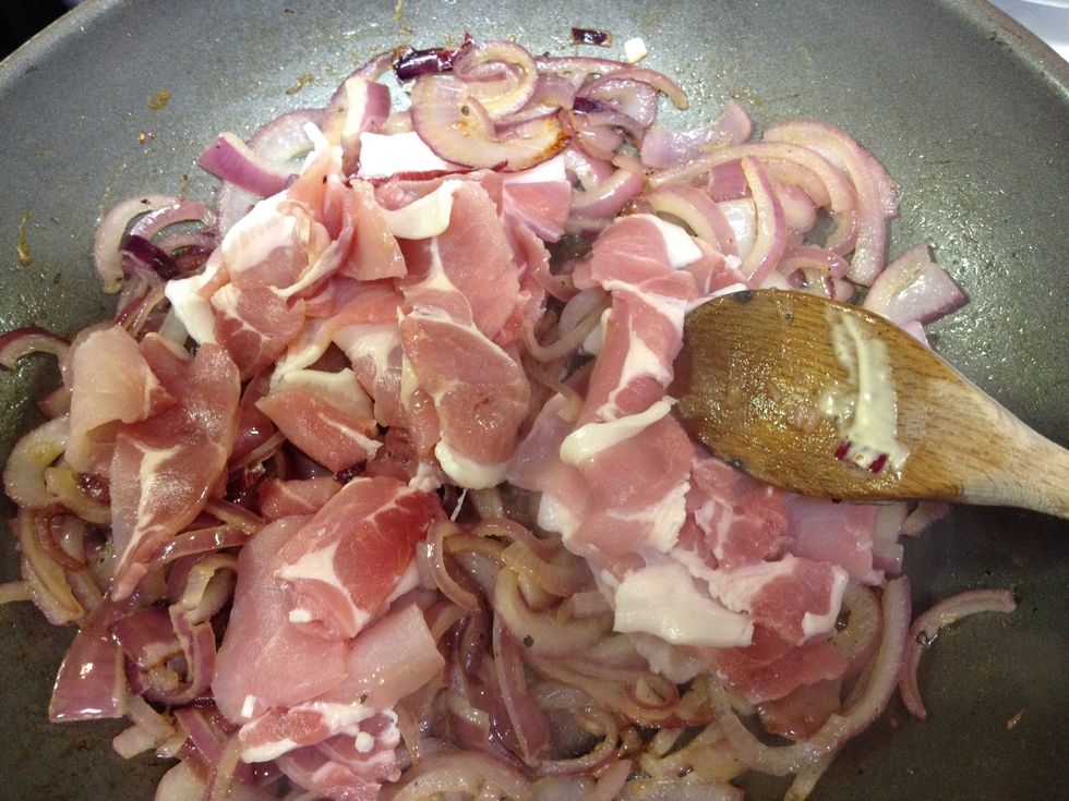 Add the bacon to the wok